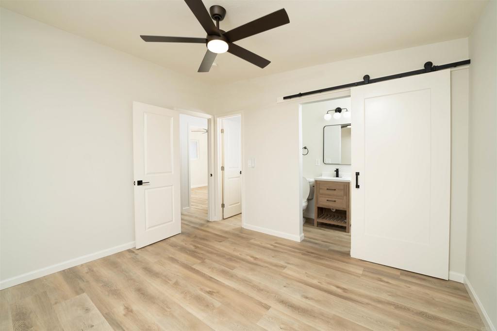 1314 Bluegrass Road Vista, CA 92083 - Photo 15 of 16 a view of empty room with wooden floor