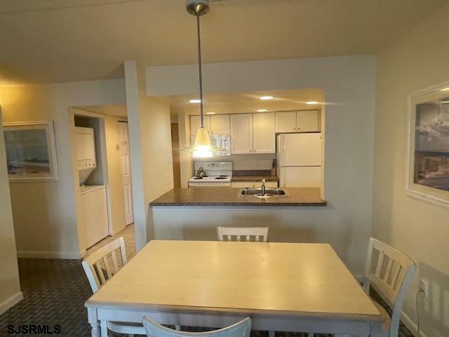 4500 West Brigantine Avenue, Unit 2216 Brigantine, NJ 08203 - Photo 5 of 14 a room with a table