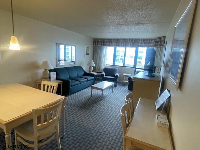4500 West Brigantine Avenue, Unit 2216 Brigantine, NJ 08203 - Photo 7 of 14 a living room with furniture and a window
