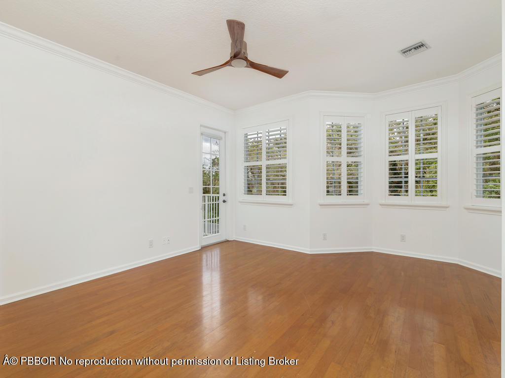 1001 Southeast Ranch Road Northeast Jupiter, FL 33478 - Photo 14 of 32 a view of empty room with windows