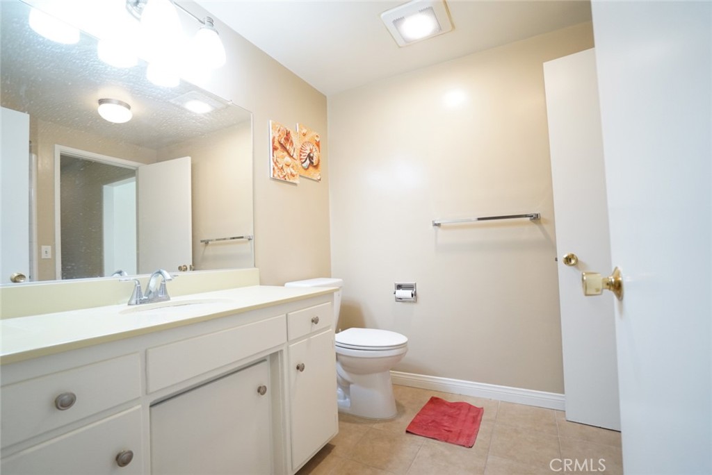 1925 El Sereno Avenue Arcadia, CA 91007 - Photo 13 of 37 a bathroom with a sink and a mirror