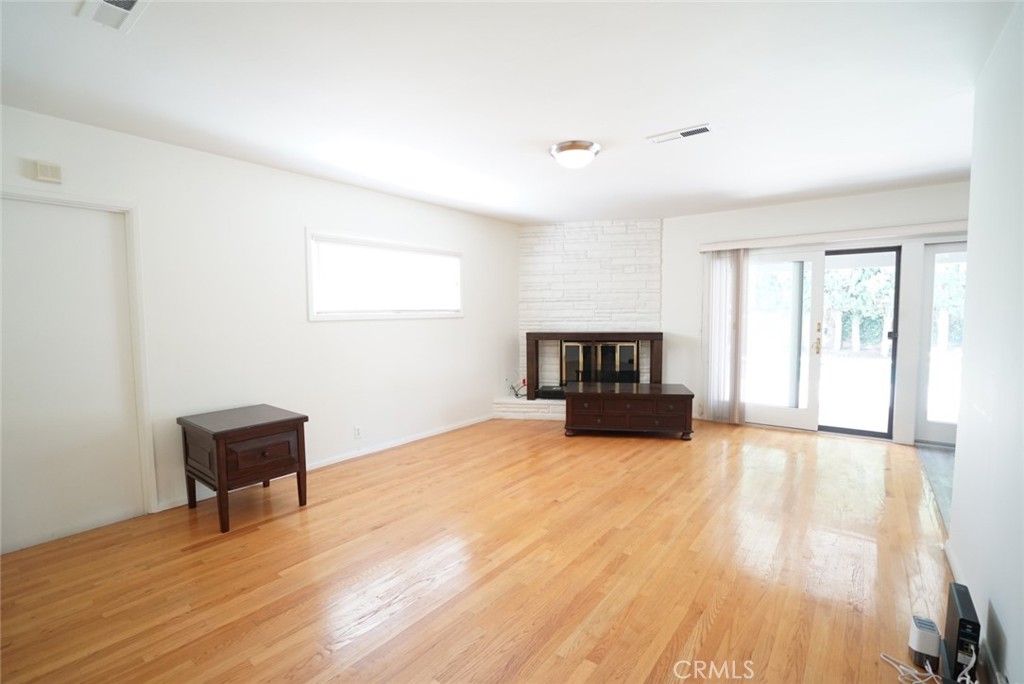 1925 El Sereno Avenue Arcadia, CA 91007 - Photo 5 of 37 a living room with furniture and a flat screen tv