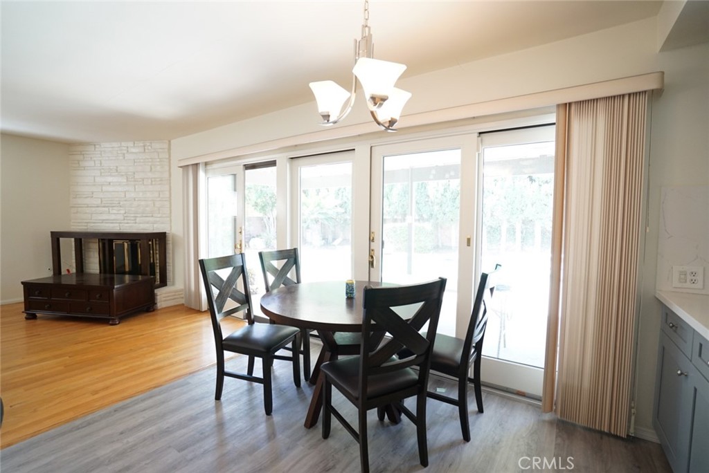 1925 El Sereno Avenue Arcadia, CA 91007 - Photo 7 of 37 a view of a dining room with furniture window and wooden floor