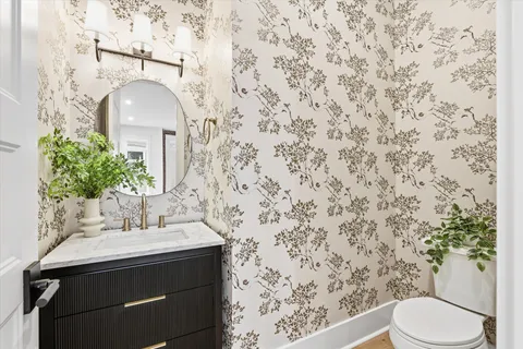 a kitchen with granite countertop stainless steel appliances and a counter space