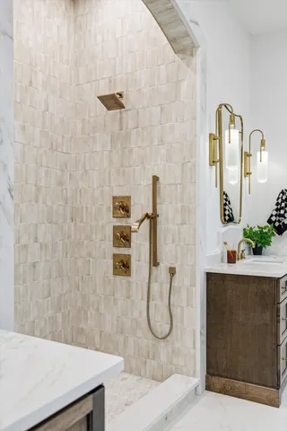 a bathroom with a double vanity sink and a mirror