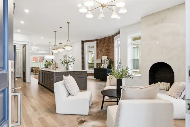 a bathroom with a sink toilet and mirror