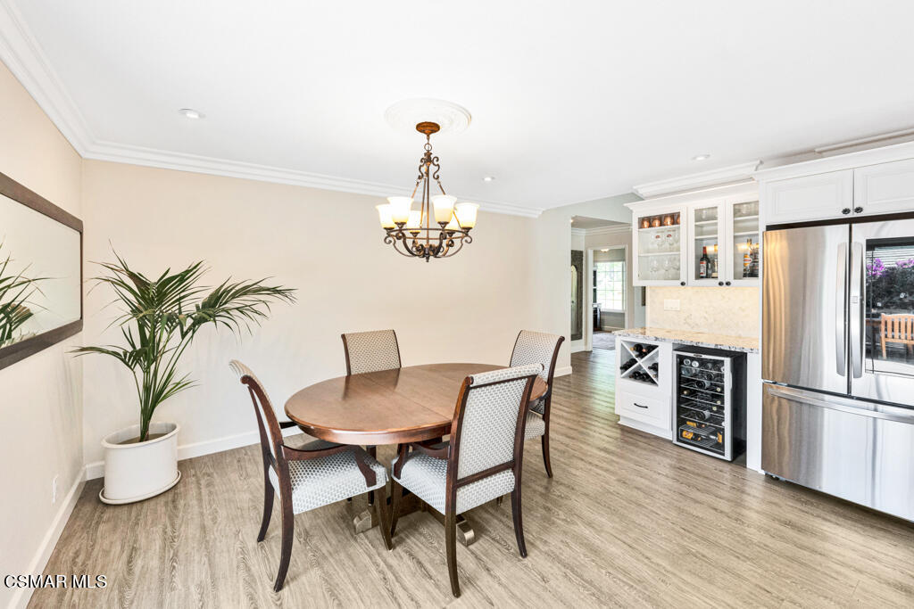 2685 Velarde Drive Thousand Oaks, CA 91360 - Photo 14 of 40 a view of a dining room with furniture window and wooden floor