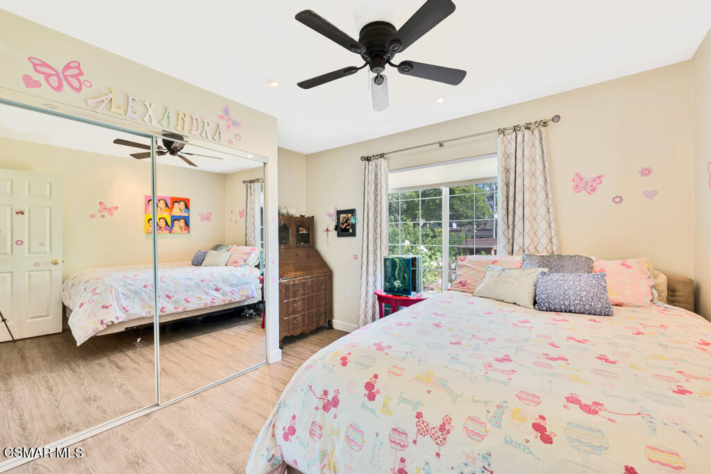 2685 Velarde Drive Thousand Oaks, CA 91360 - Photo 18 of 40 a bedroom with a bed couch and a window