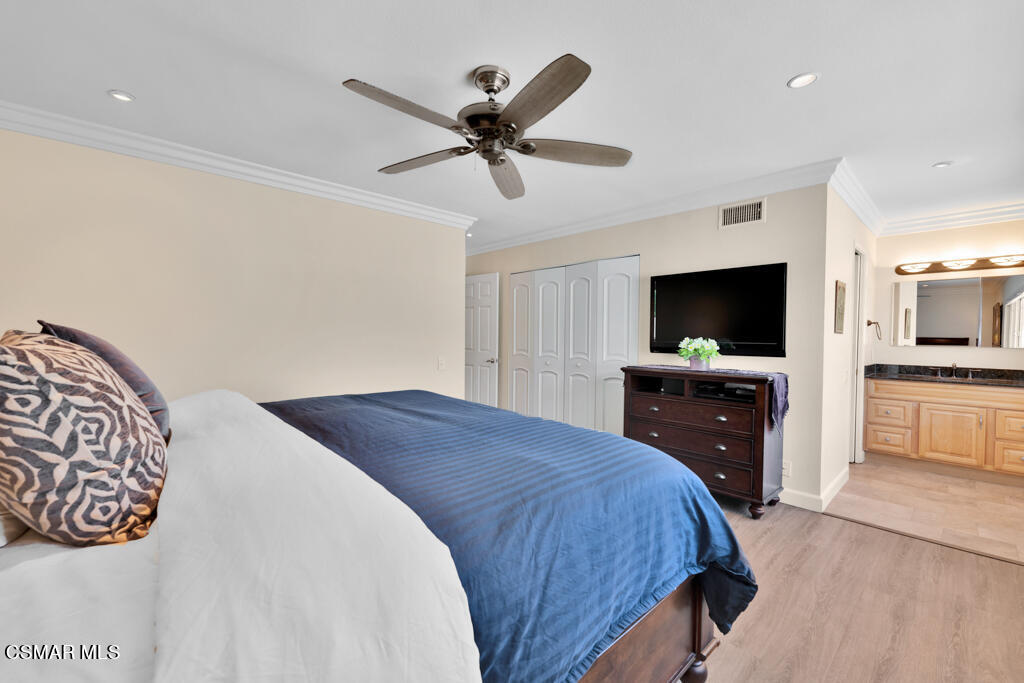 2685 Velarde Drive Thousand Oaks, CA 91360 - Photo 22 of 40 a bedroom with a bed and a flat screen tv