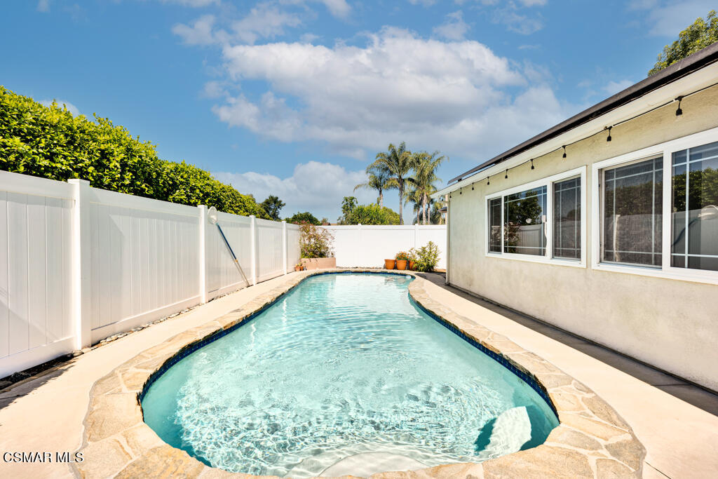 2685 Velarde Drive Thousand Oaks, CA 91360 - Photo 26 of 40 a swimming pool with trees in the background