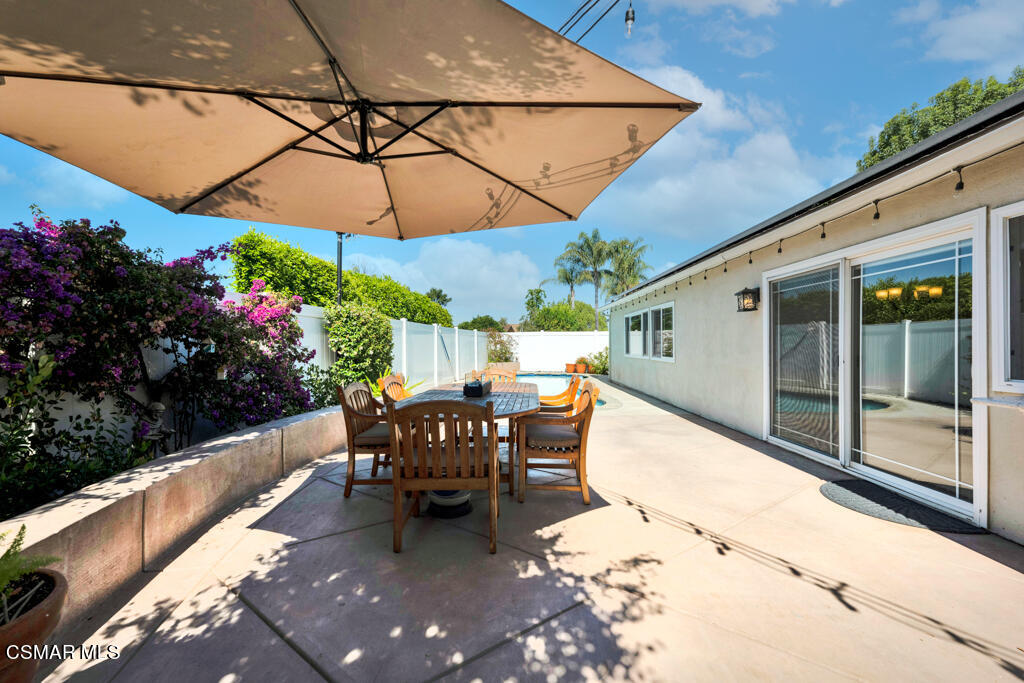 2685 Velarde Drive Thousand Oaks, CA 91360 - Photo 29 of 40 a patio with a patio table and chairs