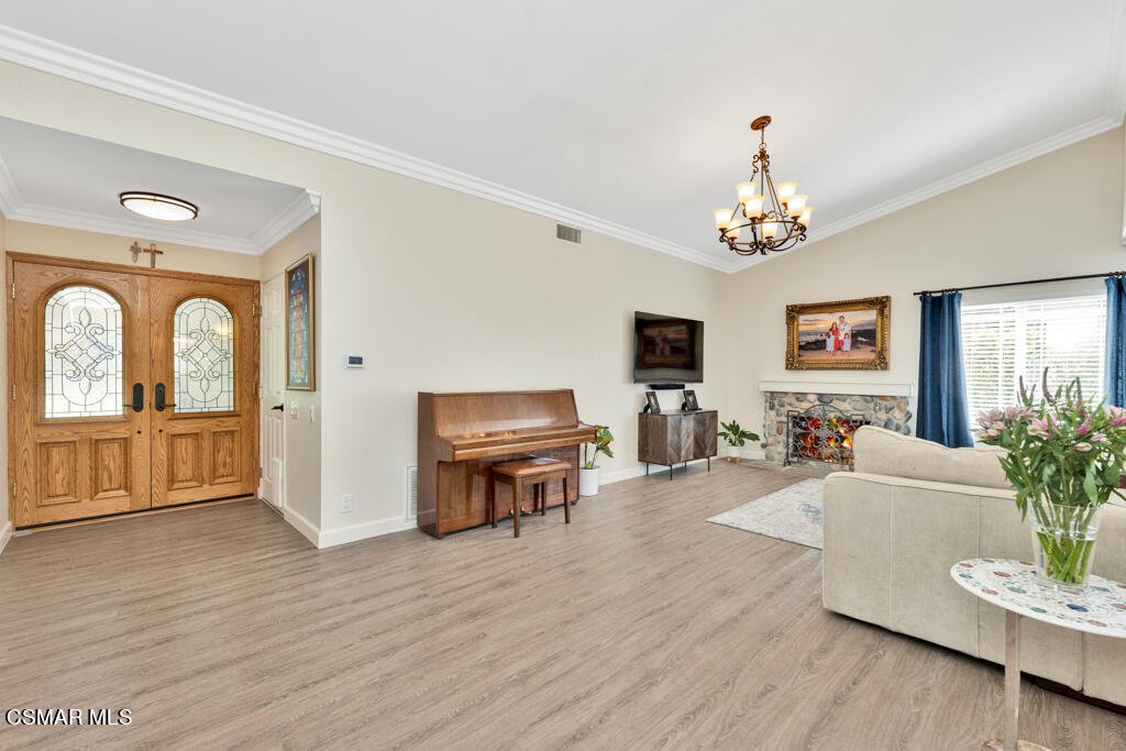 2685 Velarde Drive Thousand Oaks, CA 91360 - Photo 4 of 40 a living room with furniture two wooden floor and a fireplace