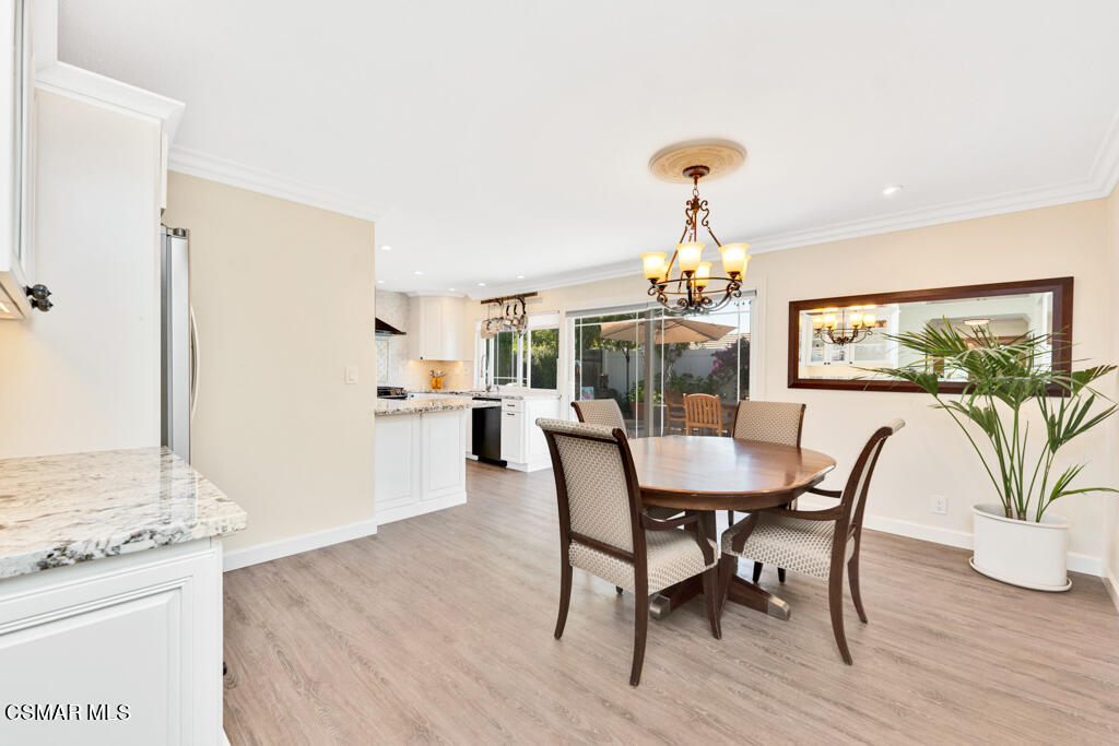 2685 Velarde Drive Thousand Oaks, CA 91360 - Photo 8 of 40 a view of a dining room with furniture window and wooden floor