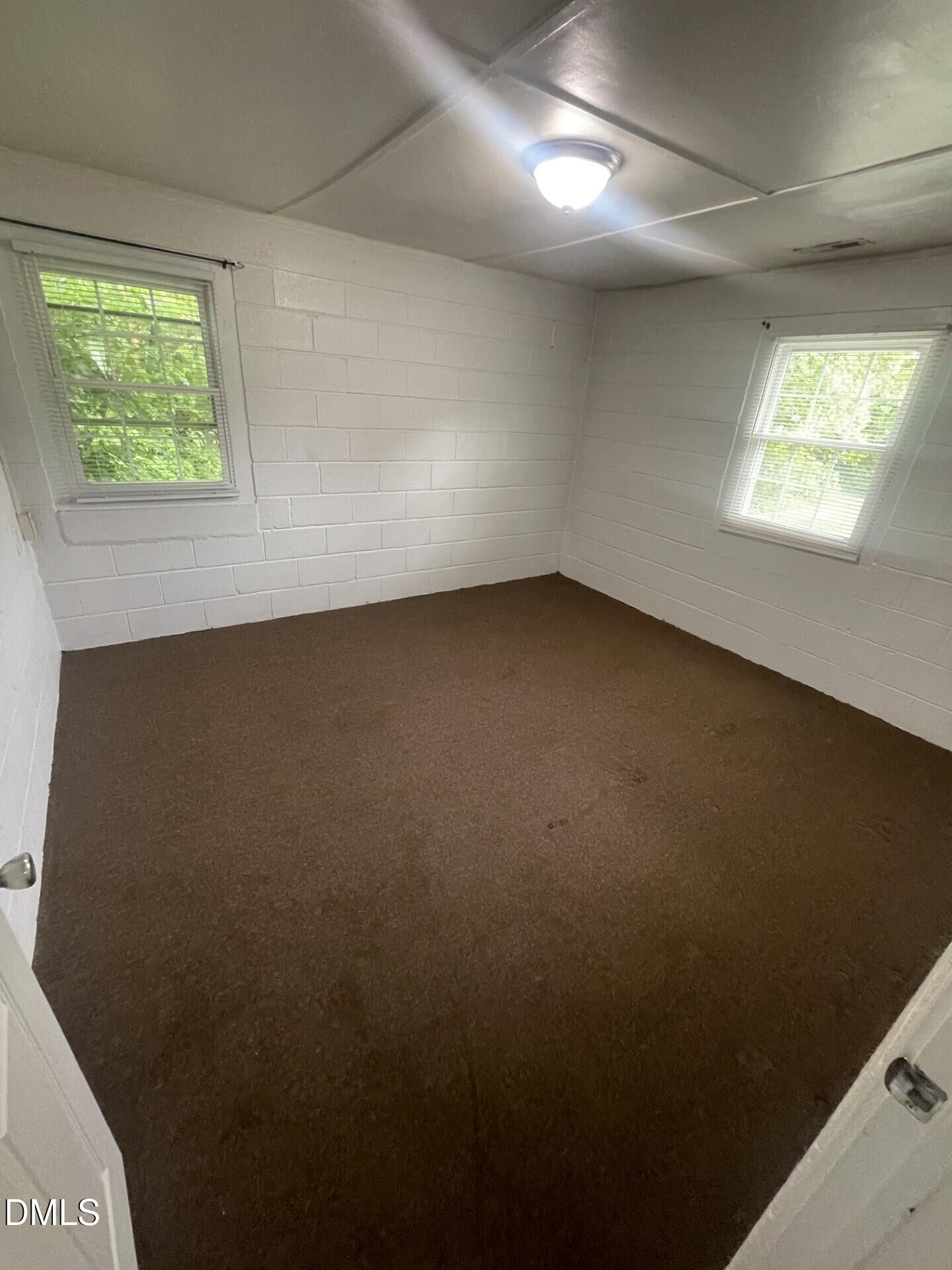 1119 Gregg Street Raleigh, NC 27601 - Photo 1 of 12 an empty room with a window