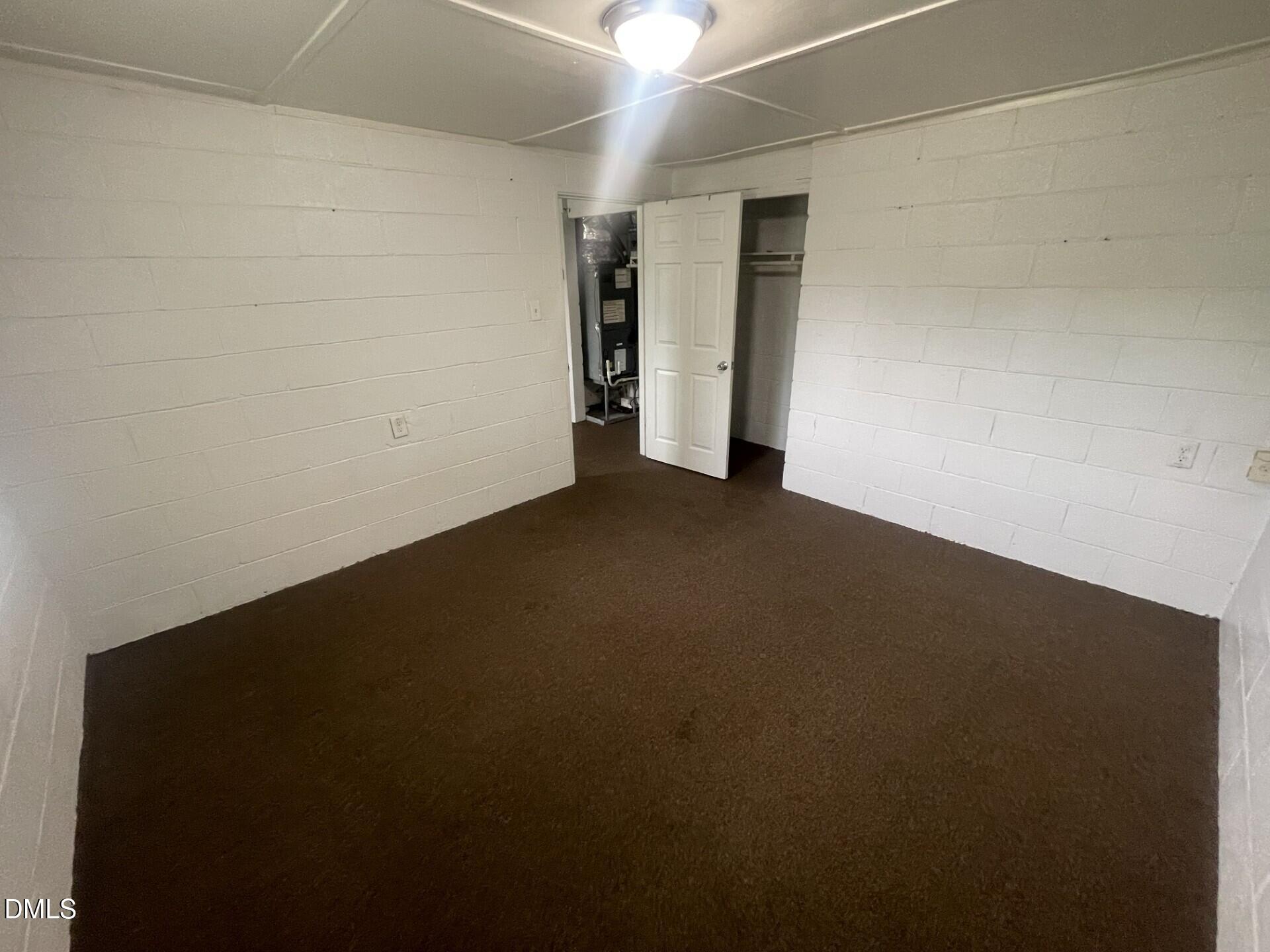1119 Gregg Street Raleigh, NC 27601 - Photo 5 of 12 an empty room with closet area
