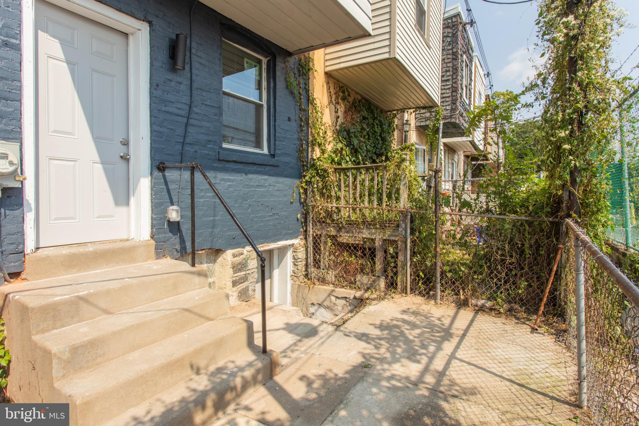 5330 Pentridge Street Philadelphia, PA 19143 - Photo 14 of 14 a bathroom with a bathtub and shower
