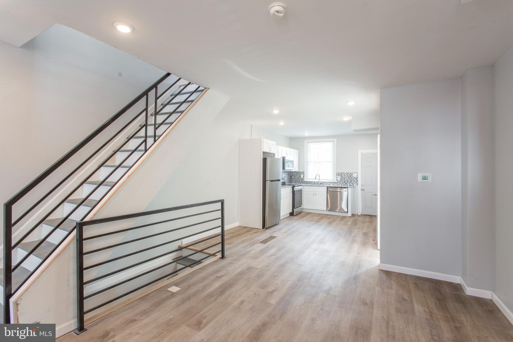 5330 Pentridge Street Philadelphia, PA 19143 - Photo 4 of 14 a view of a hallway with wooden floor