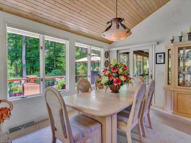 121 Spring Drive Huddleston, VA 24104 - Photo 13 of 70 a view of a dining room with furniture window and outside view