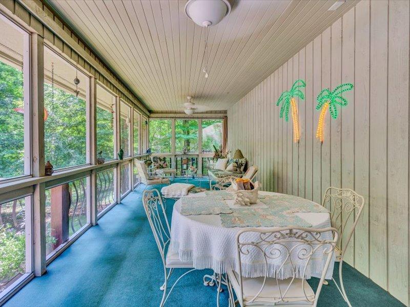 121 Spring Drive Huddleston, VA 24104 - Photo 15 of 70 a view of a dining room with furniture window and outside view