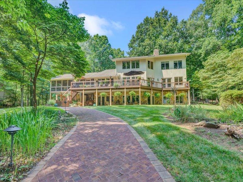 121 Spring Drive Huddleston, VA 24104 - Photo 3 of 70 a view of a house with a yard