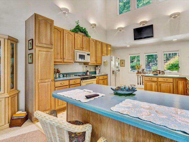 121 Spring Drive Huddleston, VA 24104 - Photo 23 of 70 a kitchen with stainless steel appliances granite countertop a refrigerator a stove and a sink