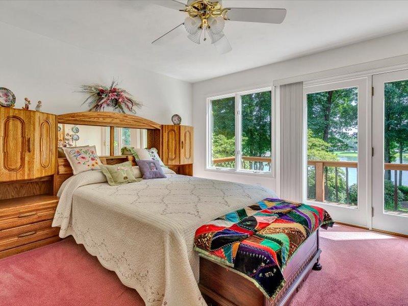 121 Spring Drive Huddleston, VA 24104 - Photo 25 of 70 a bedroom with a bed and window