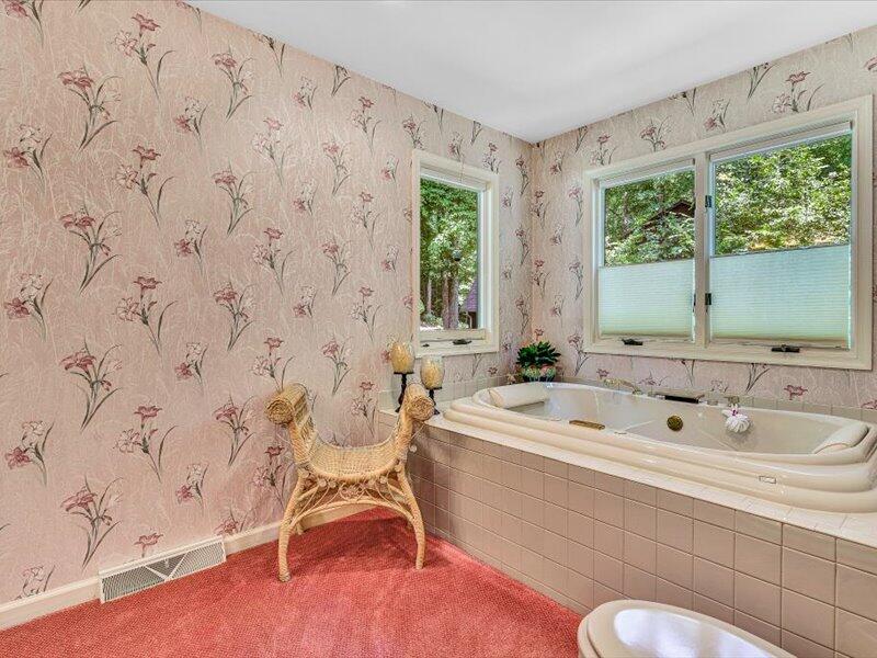 121 Spring Drive Huddleston, VA 24104 - Photo 27 of 70 a bathroom with a sink and a mirror