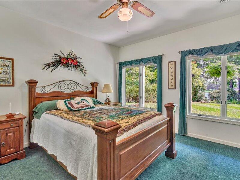 121 Spring Drive Huddleston, VA 24104 - Photo 42 of 70 a bed sitting in a bedroom next to a window