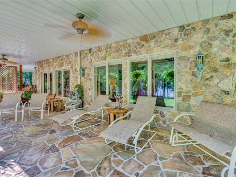 121 Spring Drive Huddleston, VA 24104 - Photo 50 of 70 a view of a patio with table and chairs and potted plants