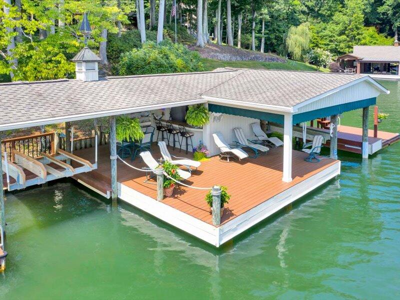 121 Spring Drive Huddleston, VA 24104 - Photo 62 of 70 an aerial view of a house having patio with a garden