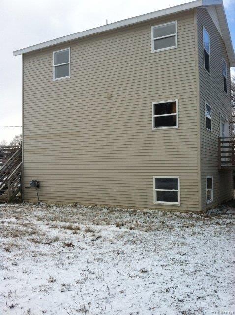 10939 Converse Road Fowlerville, MI 48836 - Photo 3 of 9 side view.jpg