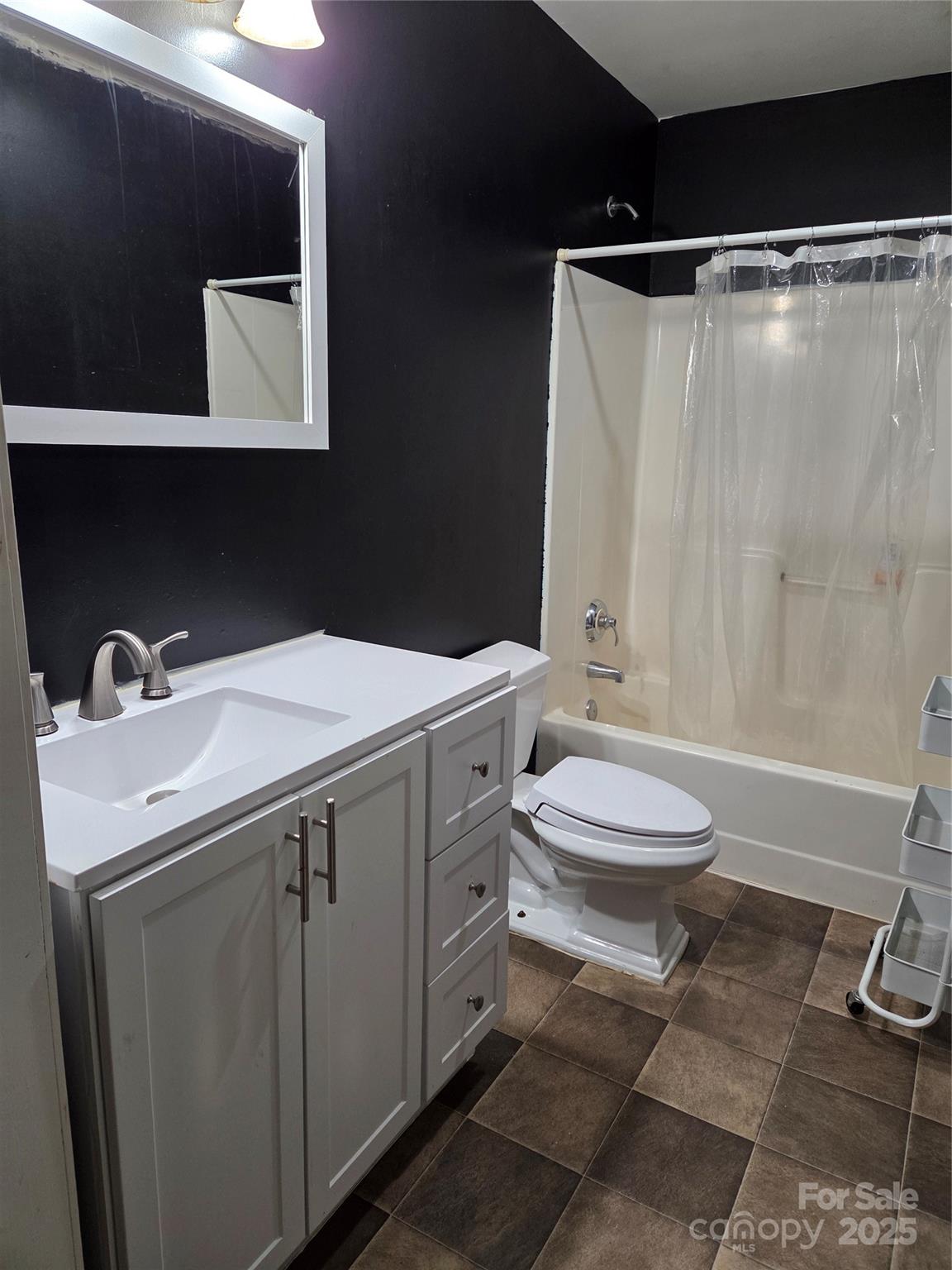 68 Garden Ridge Clyde, NC 28721 - Photo 12 of 16 a bathroom with a sink toilet and shower