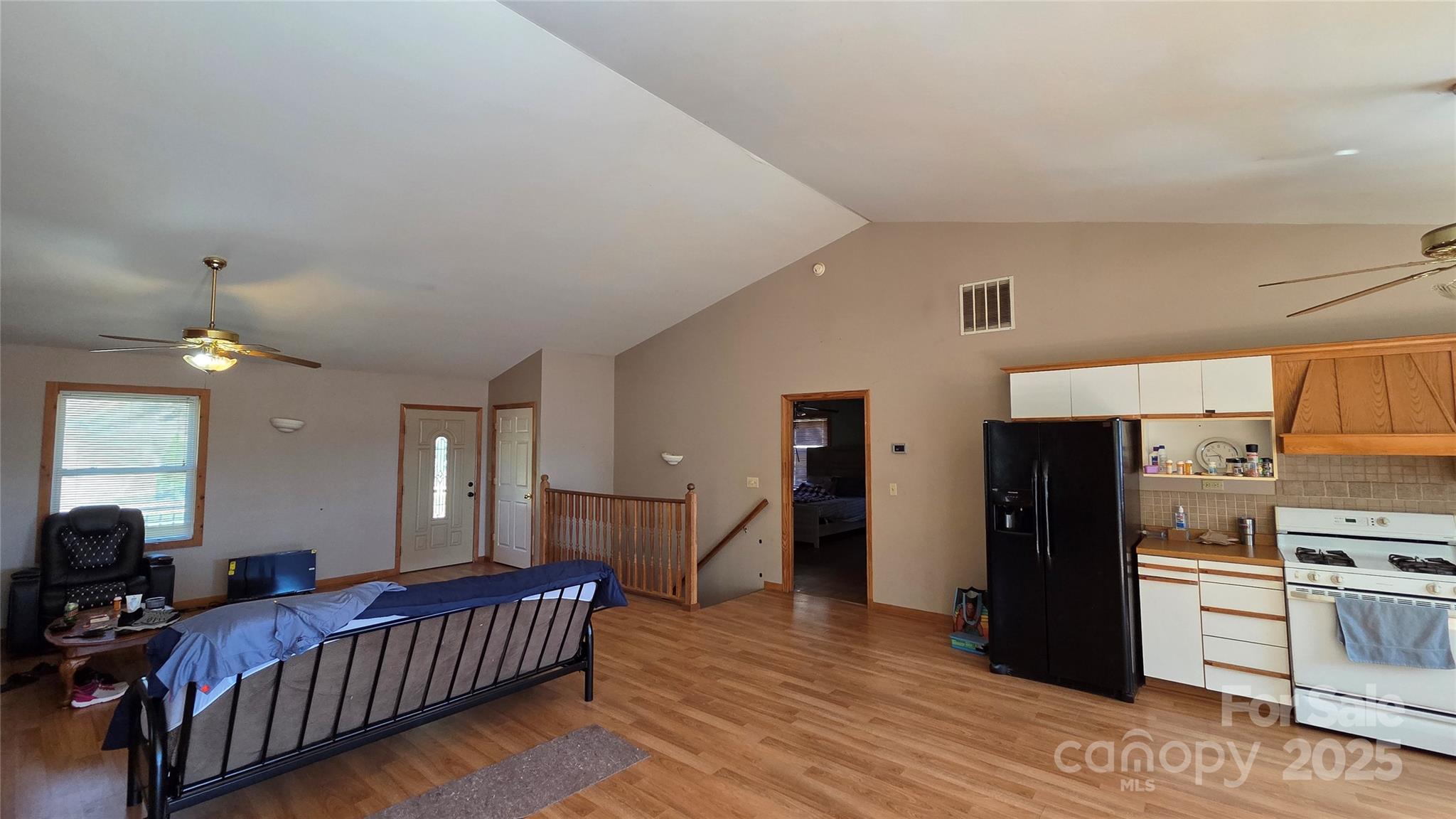 68 Garden Ridge Clyde, NC 28721 - Photo 7 of 16 a bedroom with furniture and a bed