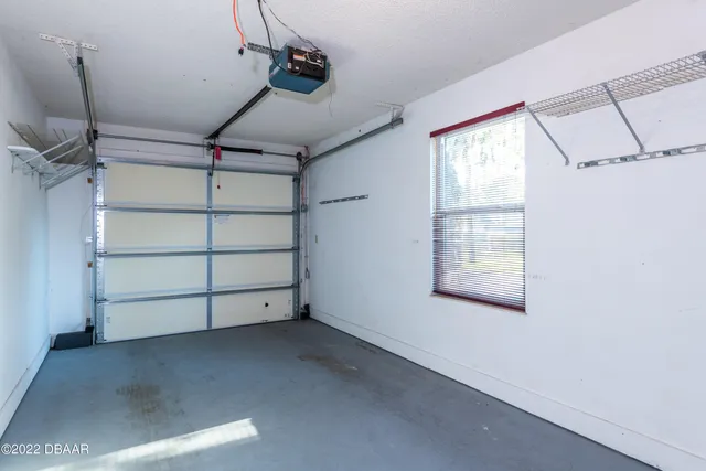 a view of a garage room and a window