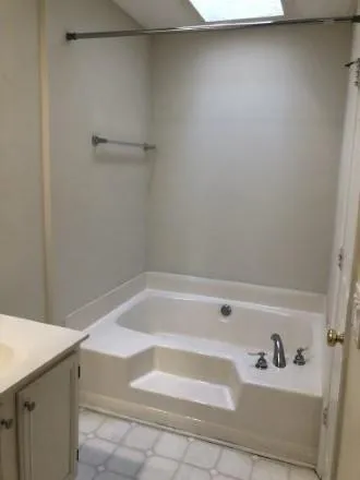 a bathroom with a bathtub