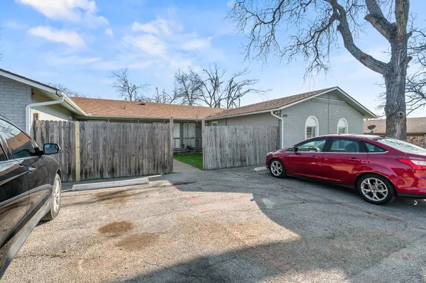 a car parked in front of a house
