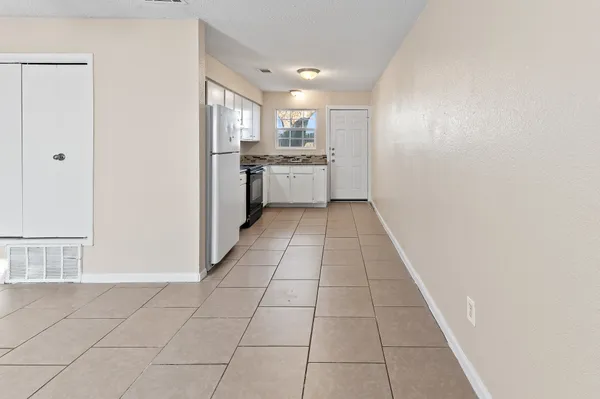 a view of a kitchen with a sink