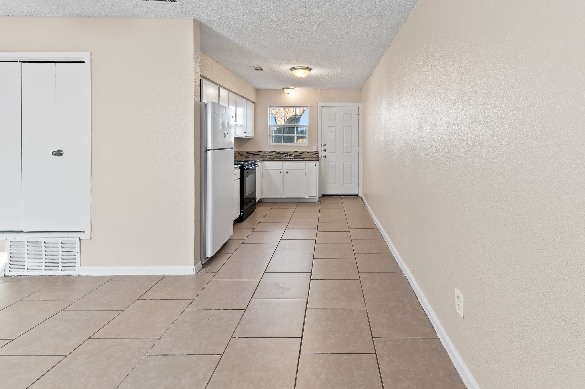 410 Old Thorndale Road, Unit A Taylor, TX 76574 - Photo 9 of 28 a view of a kitchen with a sink