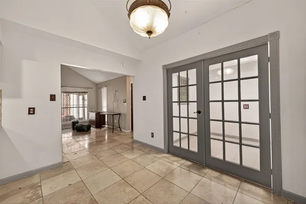 a view of empty room with windows