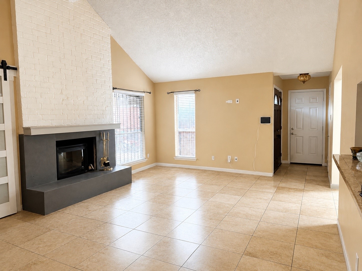 11331 Oakcenter Drive Houston, TX 77072 - Photo 12 of 36 a view of a livingroom with a fireplace and window