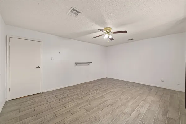 a view of a backyard with a small cabin