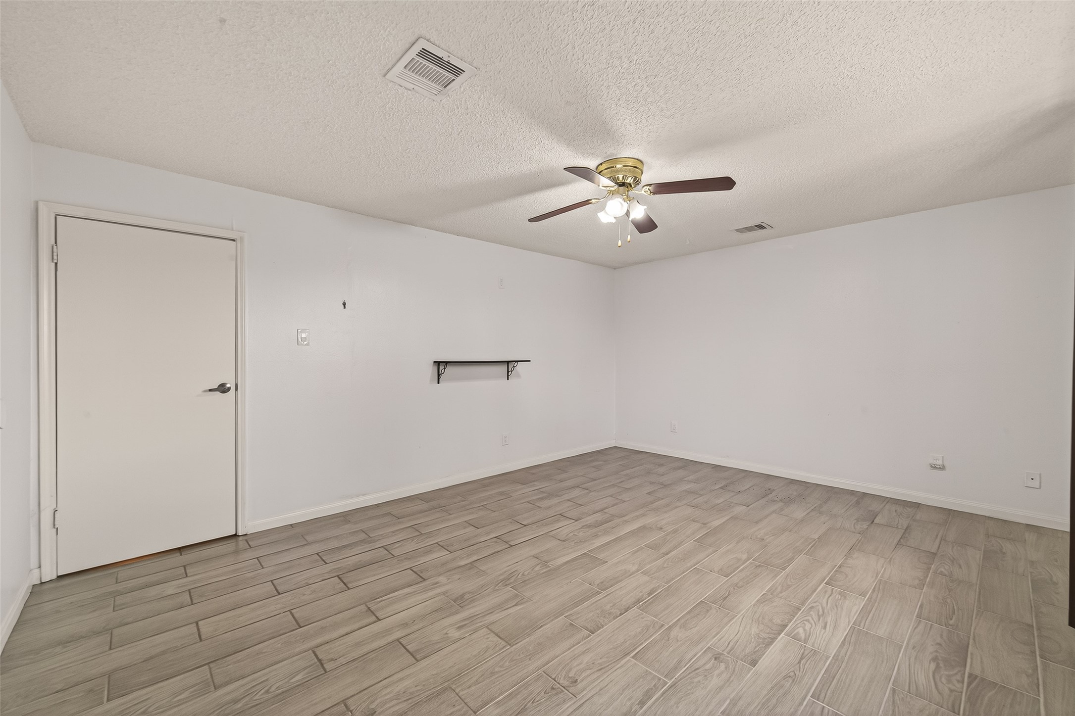 11331 Oakcenter Drive Houston, TX 77072 - Photo 25 of 36 wooden floor in an empty room