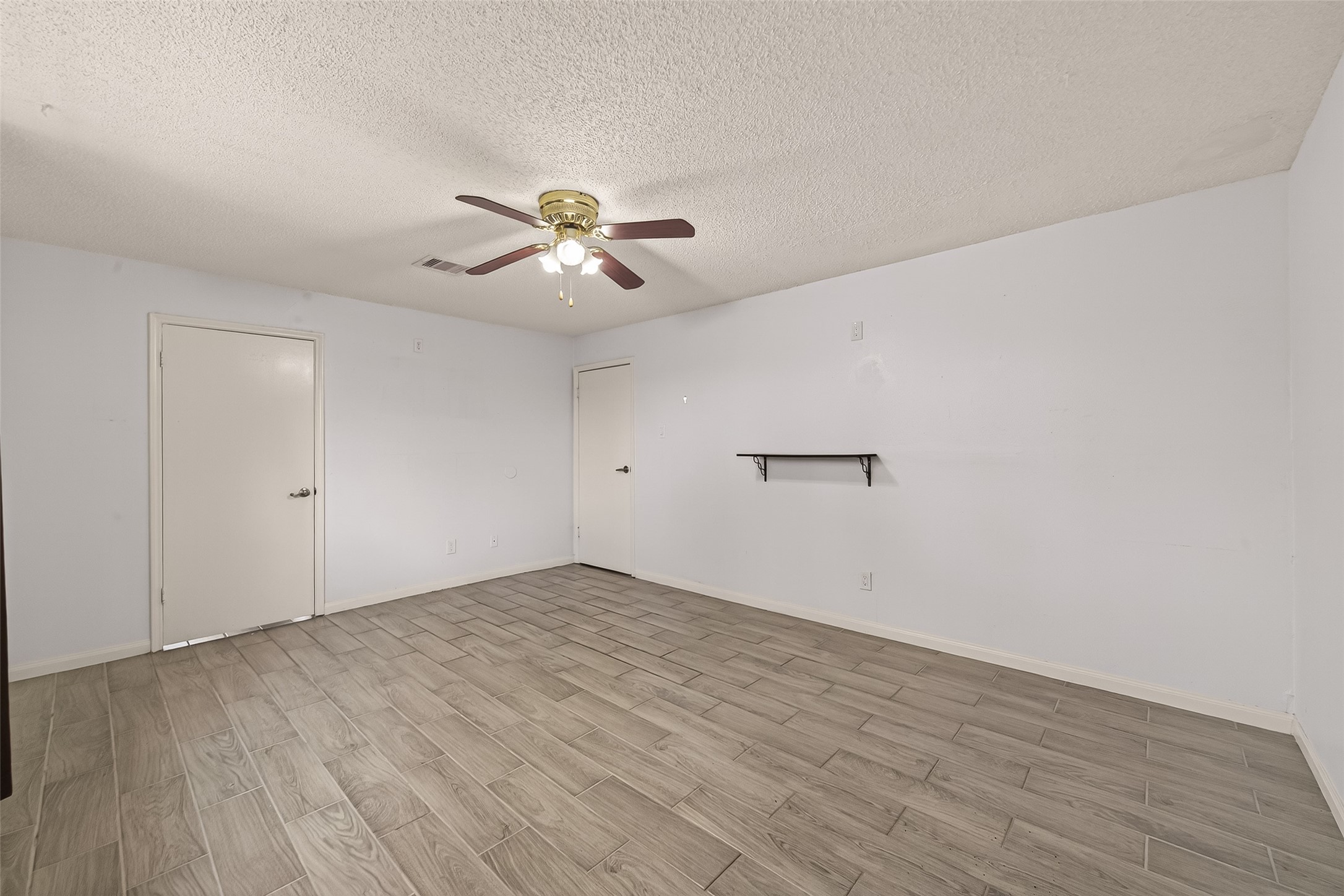 11331 Oakcenter Drive Houston, TX 77072 - Photo 26 of 36 a view of an empty room with a window