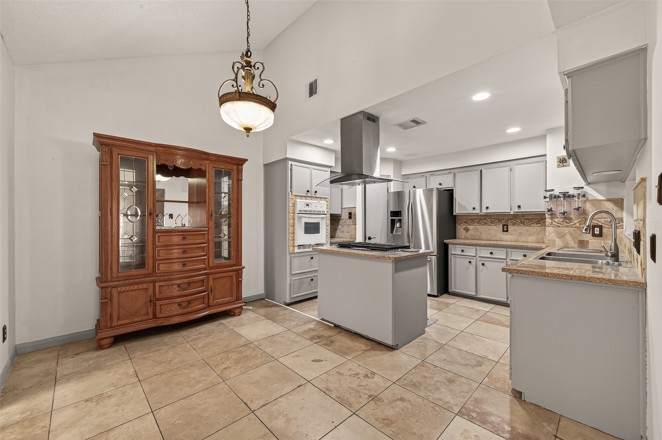 11331 Oakcenter Drive Houston, TX 77072 - Photo 4 of 36 a large kitchen with lots of counter space and appliances