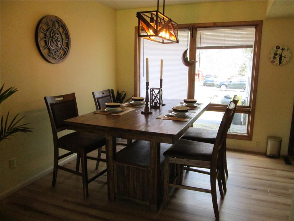 4717 Ellwood Road New Castle, PA 16101 - Photo 12 of 32 a dining room with furniture and wooden floor