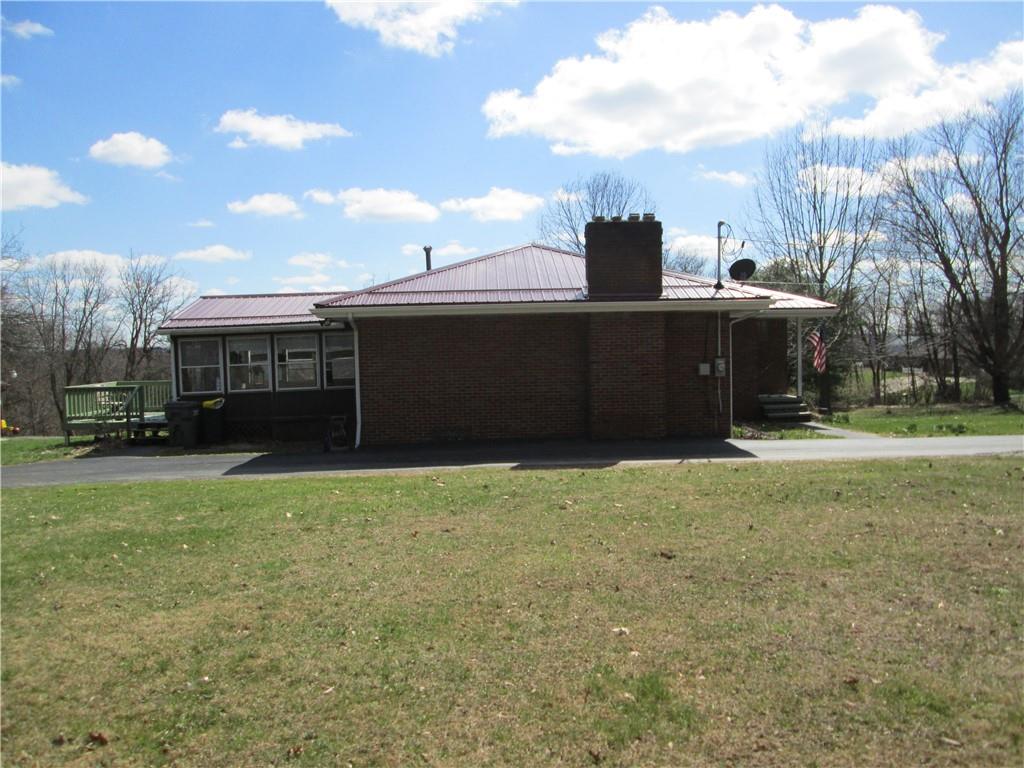 4717 Ellwood Road New Castle, PA 16101 - Photo 2 of 32 a view of a house with a backyard