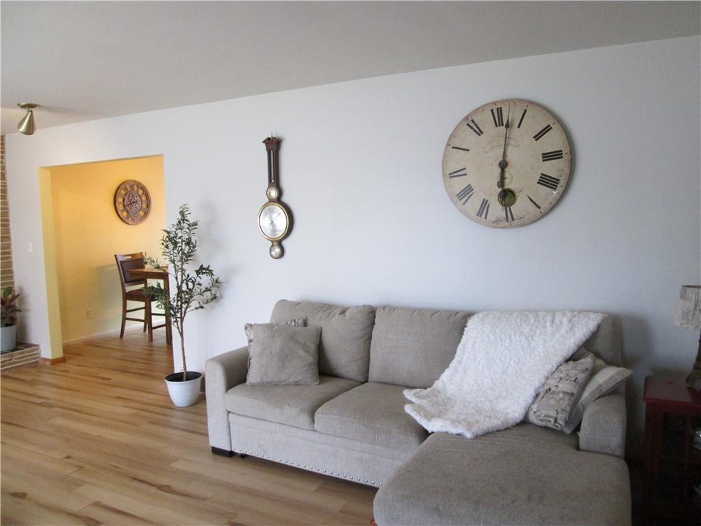 4717 Ellwood Road New Castle, PA 16101 - Photo 21 of 32 a living room with furniture and wooden floor