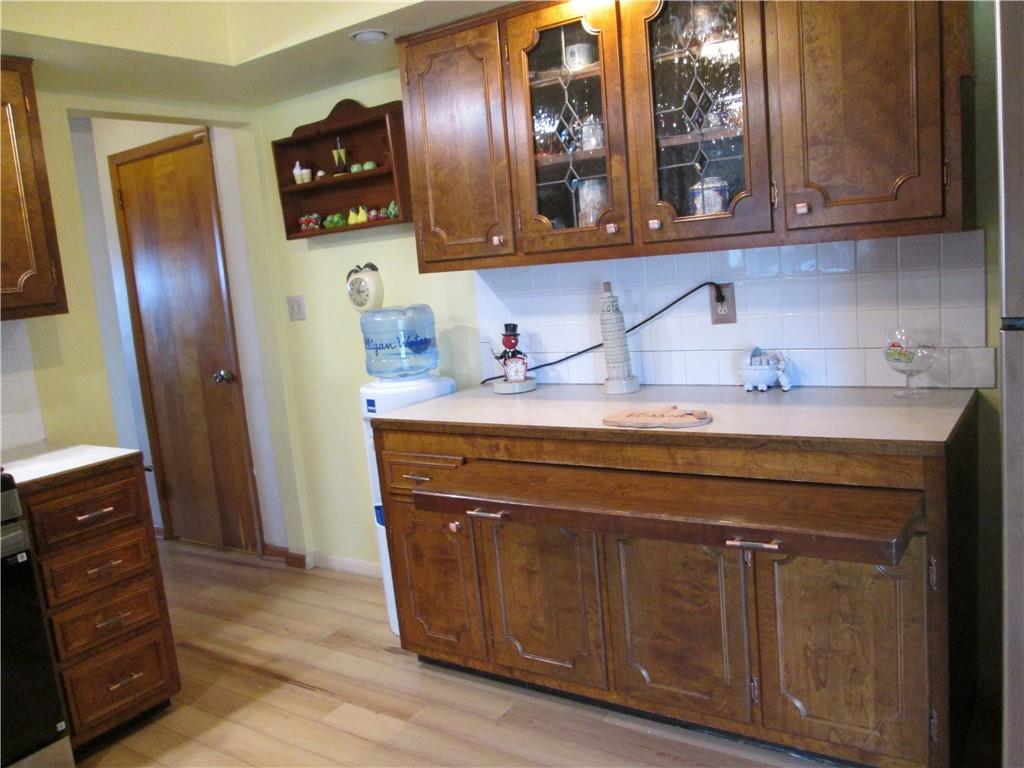 4717 Ellwood Road New Castle, PA 16101 - Photo 8 of 32 a bathroom with a sink and a mirror