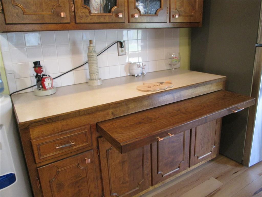 4717 Ellwood Road New Castle, PA 16101 - Photo 9 of 32 a kitchen with a sink and cabinets