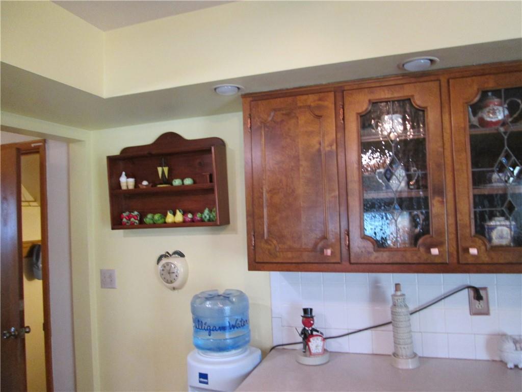 4717 Ellwood Road New Castle, PA 16101 - Photo 10 of 32 a front view of a house with entryway and wooden floor